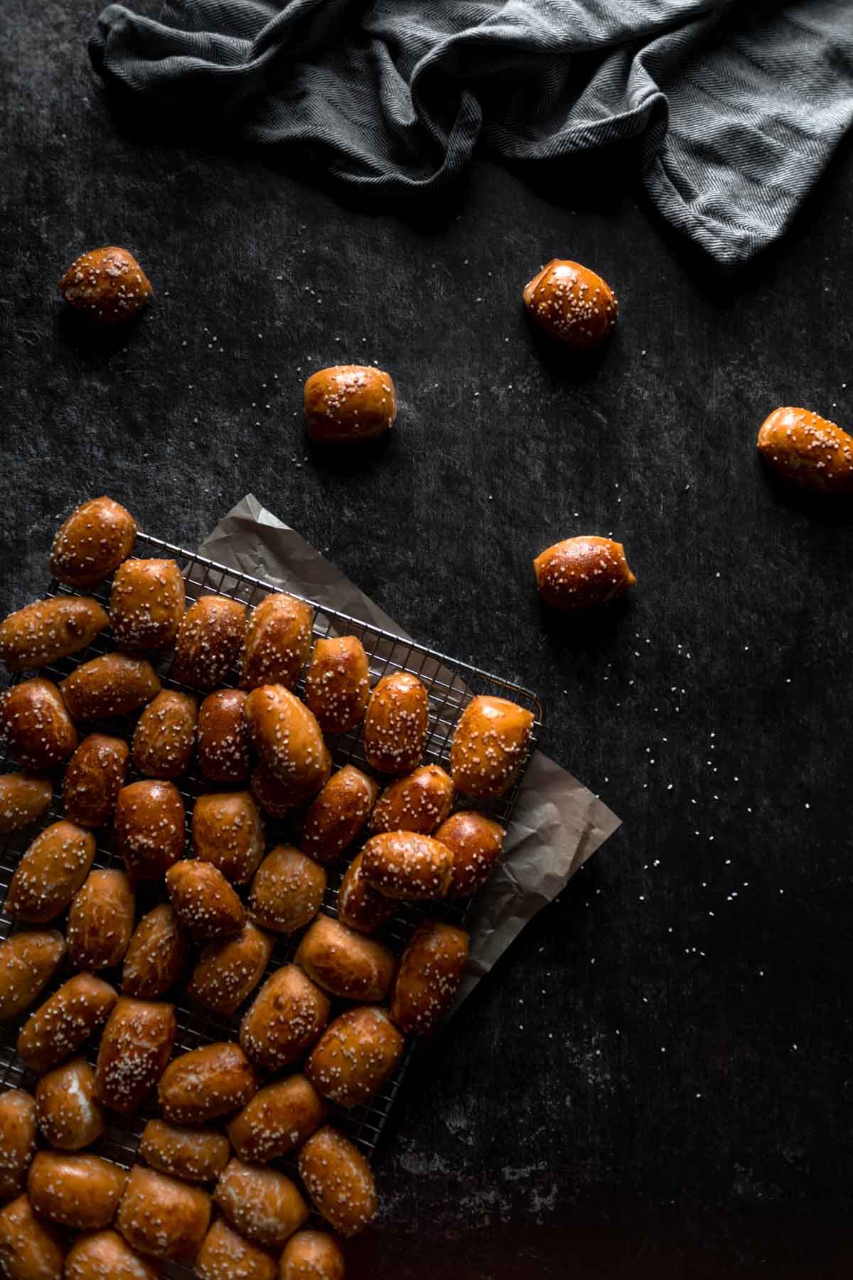 Peanut Butter filled pretzel nuggets cooling on a rack.