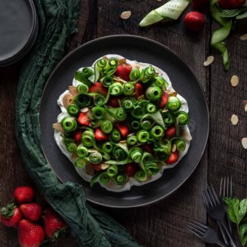 overhead view of cucumber strawberry salad