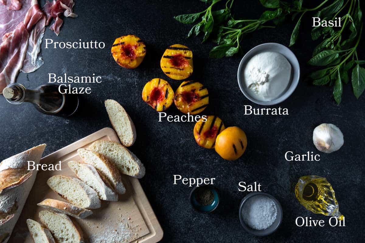 Image of ingredients needed for this recipe: peaches, prosciutto, bread, pepper, salt, garlic, olive oil, basil and balsamic reduction