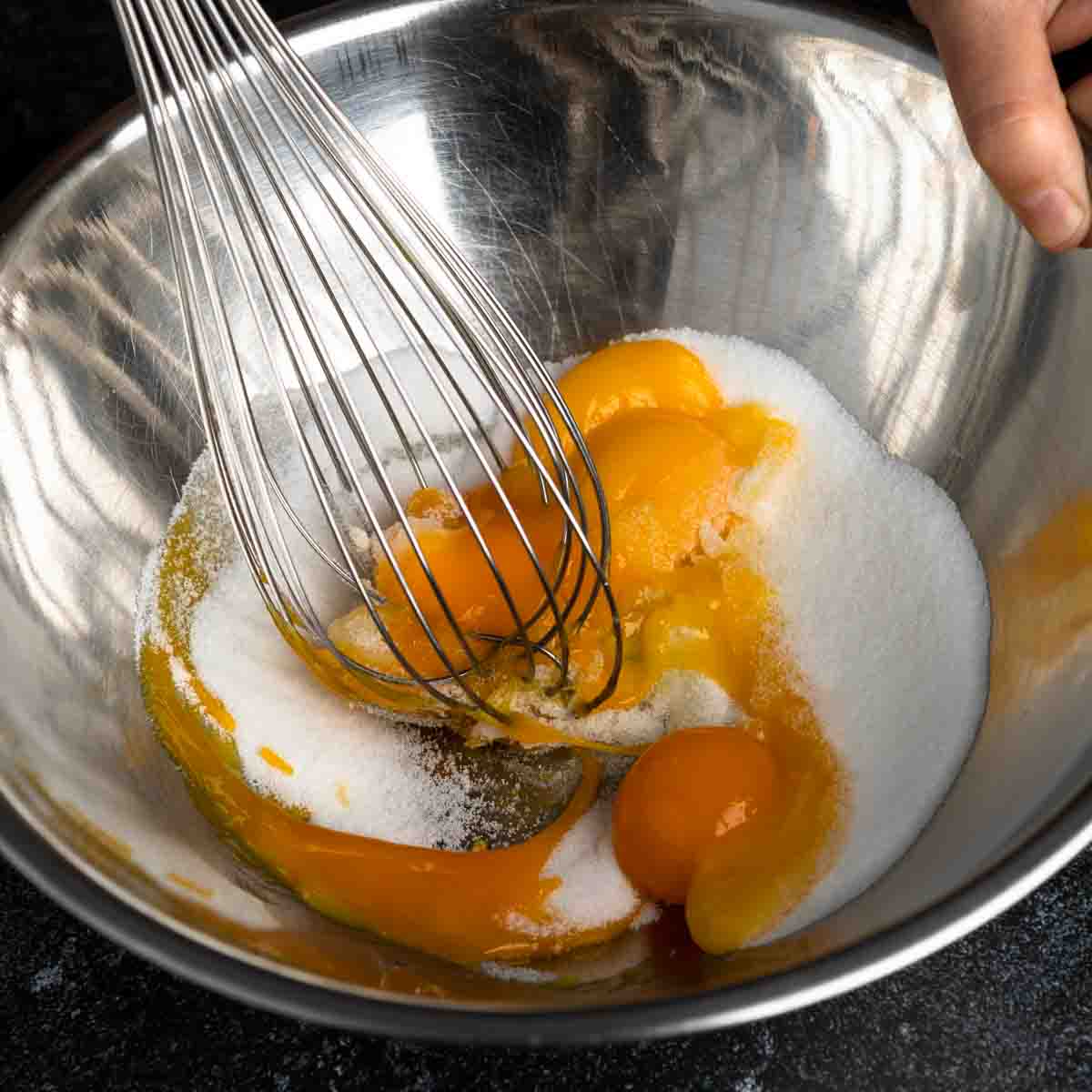 Whisking egg yolks and sugar together