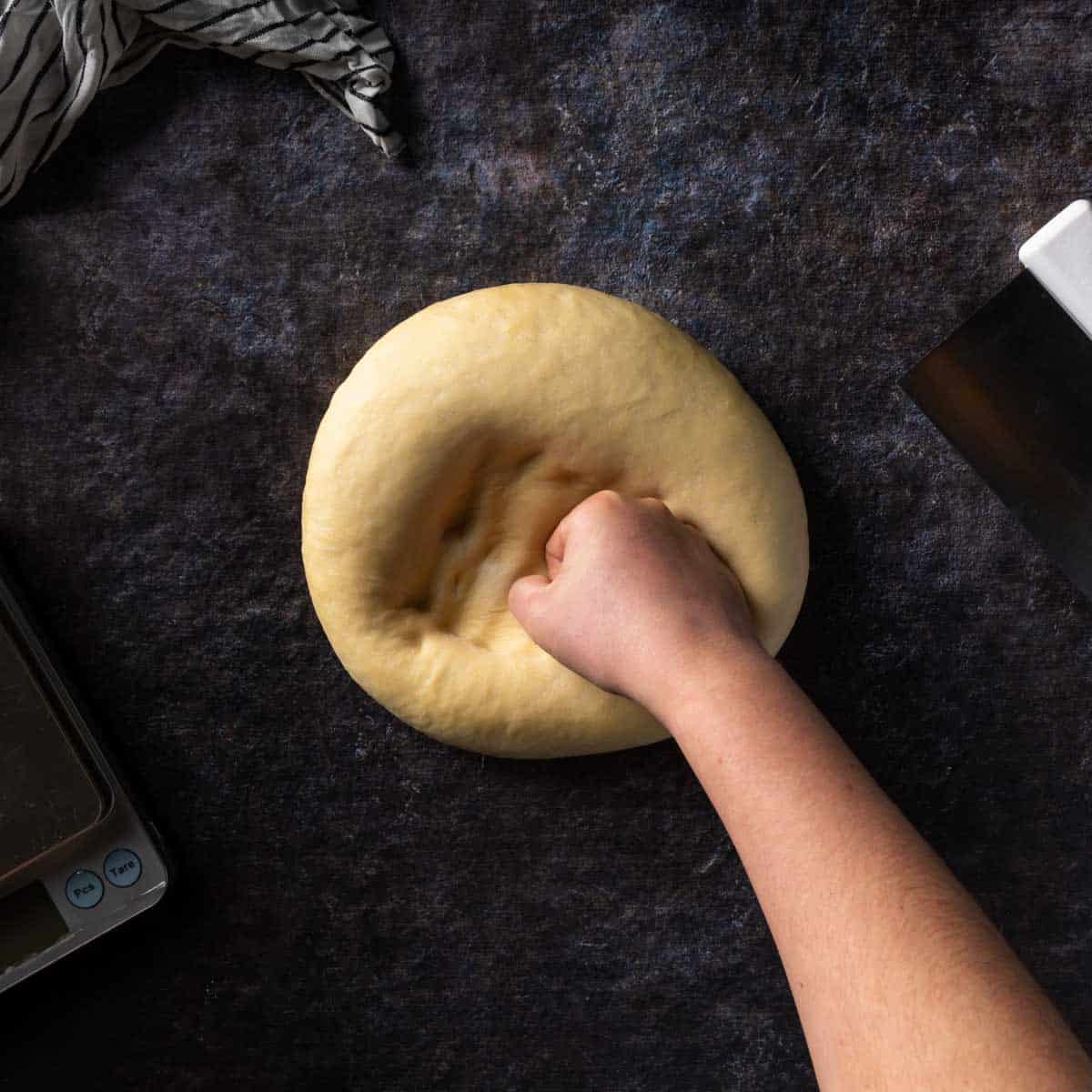 punching down the challah dough