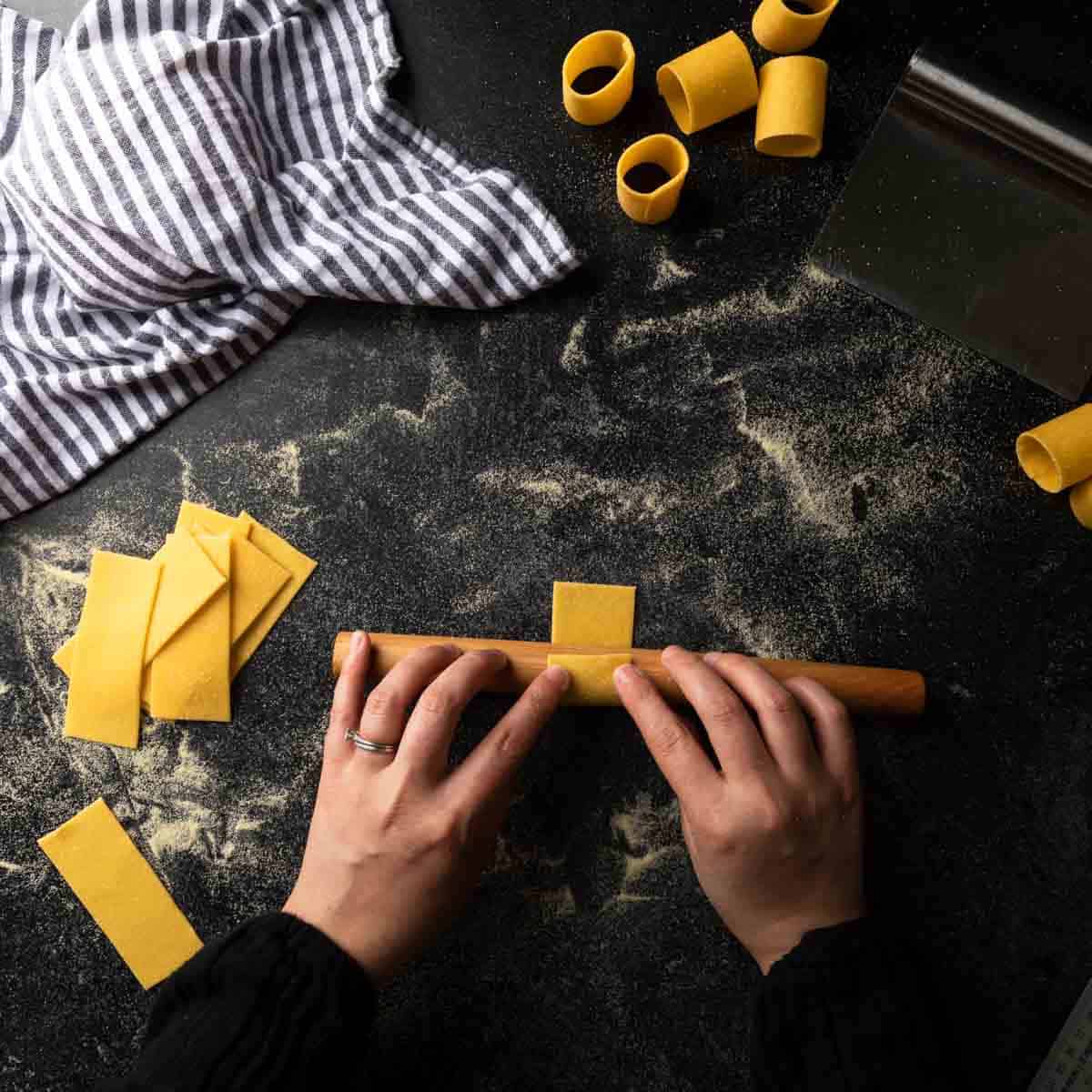 Rolling a rectangle of dough around a mini rolling pin