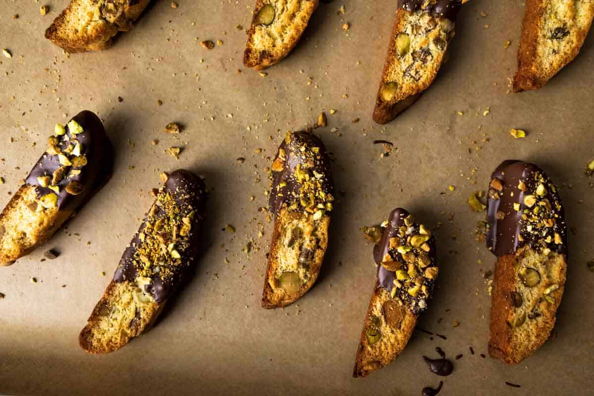 Baking Up Batches of Pistachio Biscotti Dipped in White Chocolate