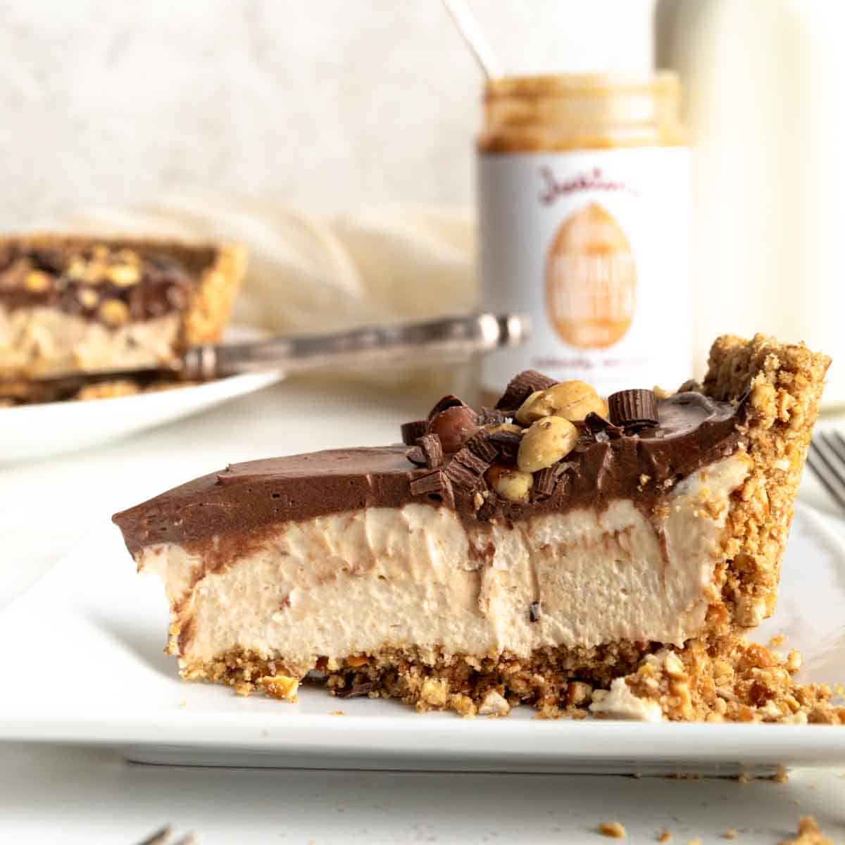 A slice of no bake chocolate peanut butter pie on a plate