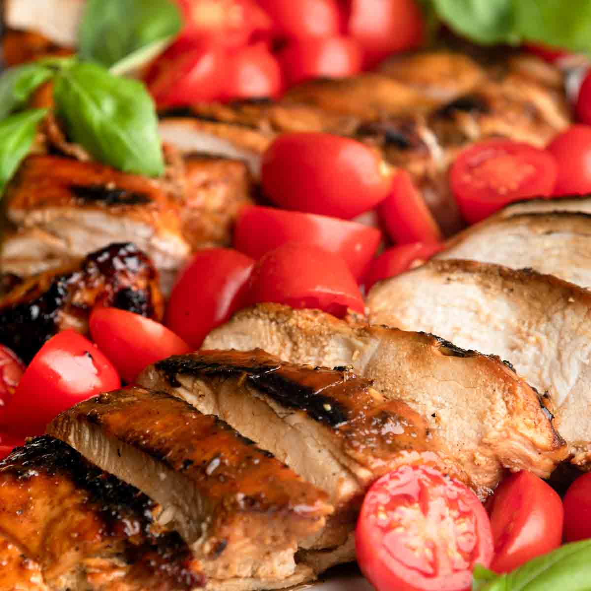 A close up of sliced honey balsamic chicken breasts