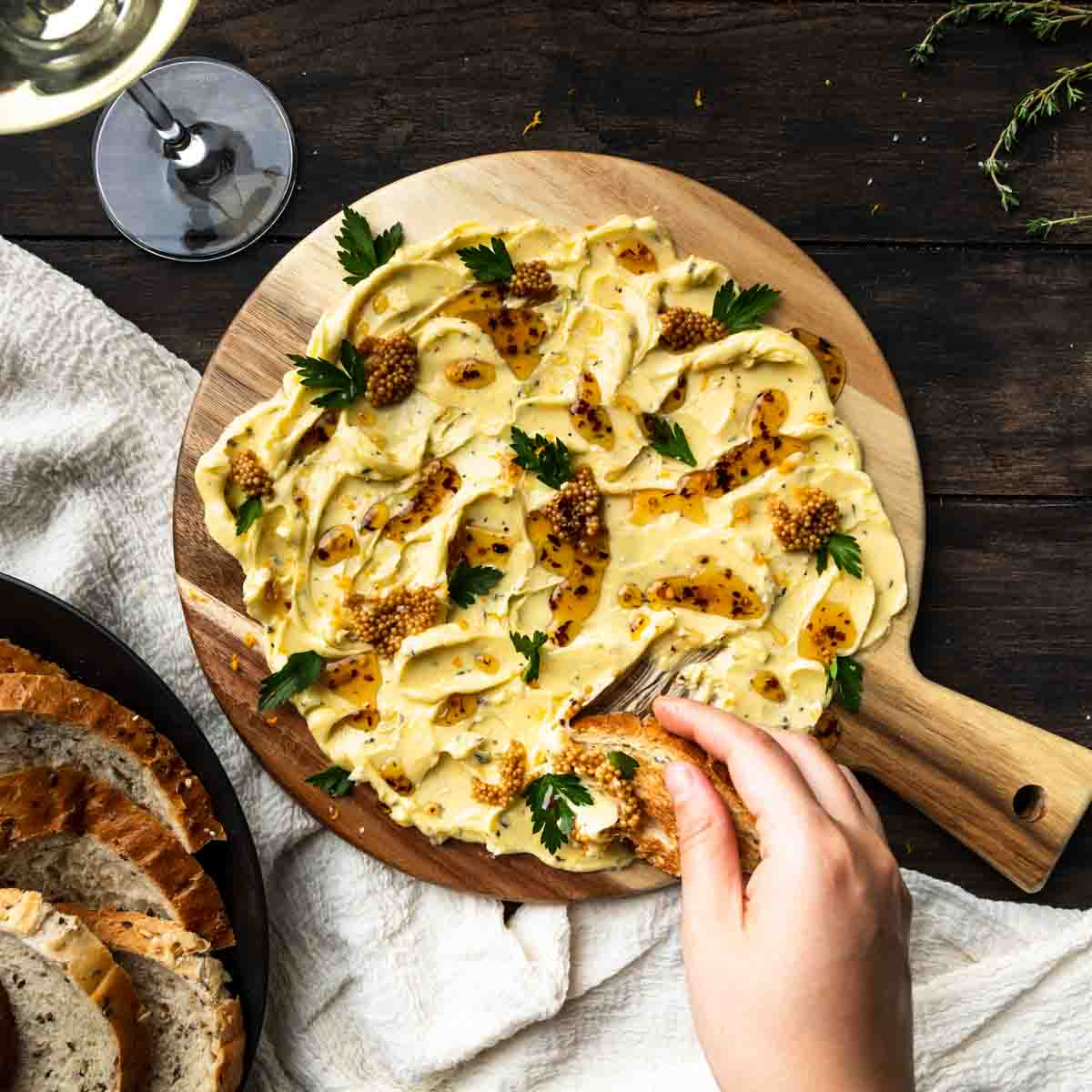 Using crust bread to scrape up butter from the best butter board