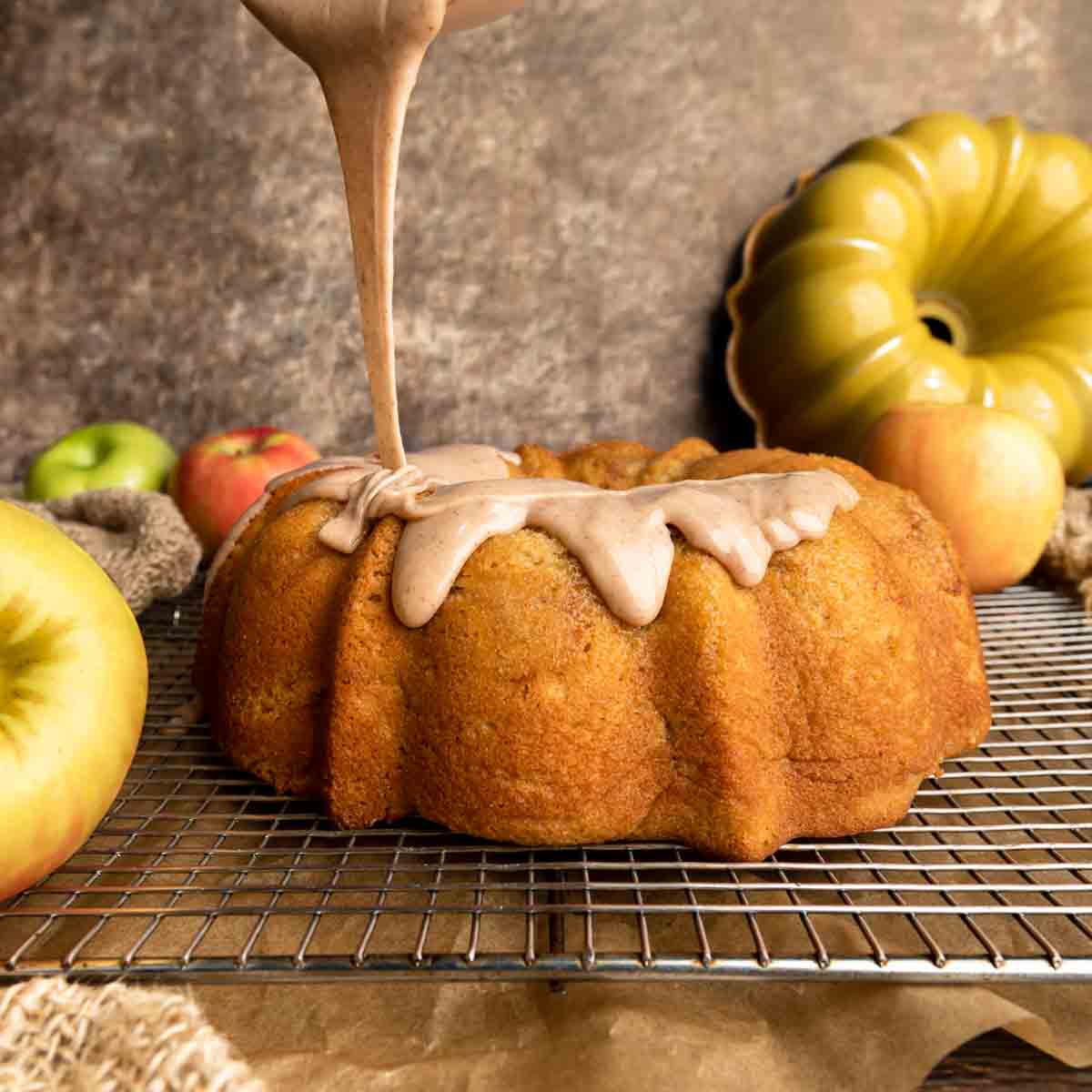 Pouring the cider glaze over the Jewish apple cake