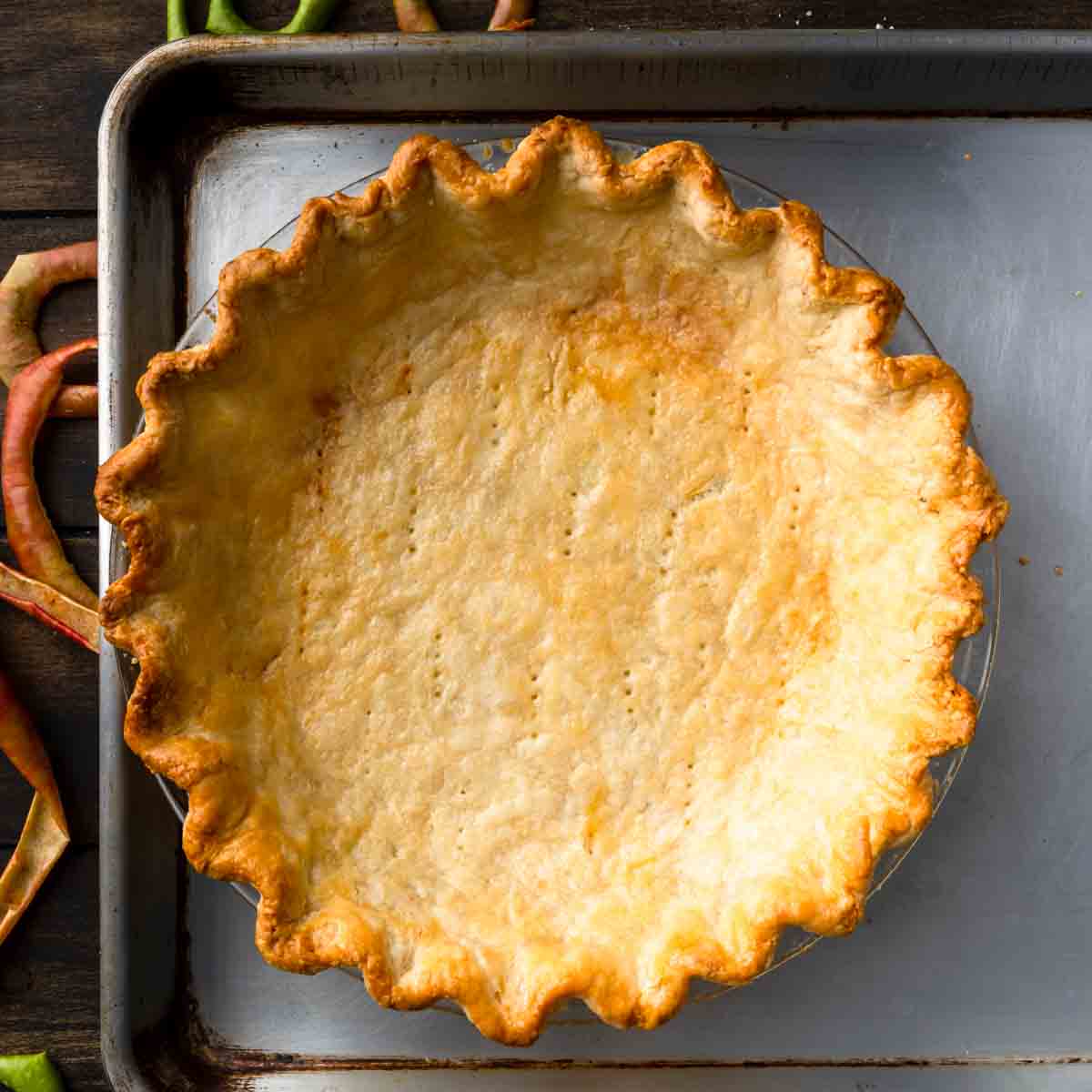 A golden brown blind baked pie crust