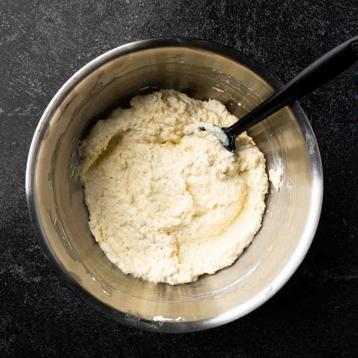 Four cheese ravioli filling in a mixing bowl.