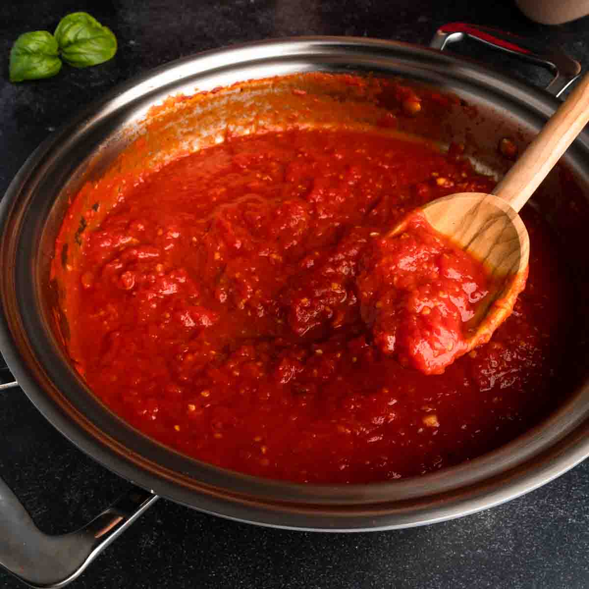 A spoonful of quick marinara sauce made with San Marzano tomatoes.