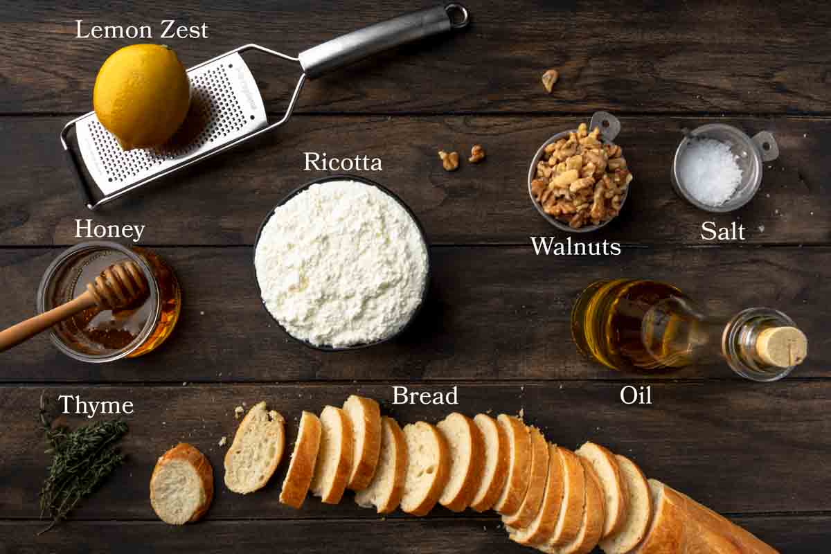 Ingredients needed to make whipped ricotta crostinis with honey. 