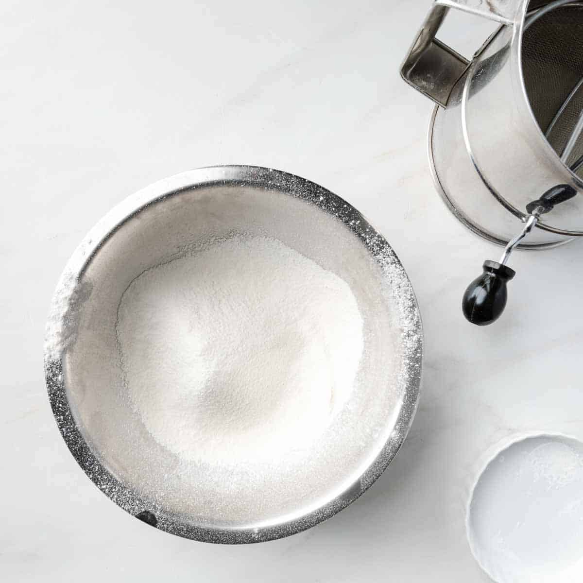 Sifted flour, cornstarch, baking powder and salt in a bowl.
