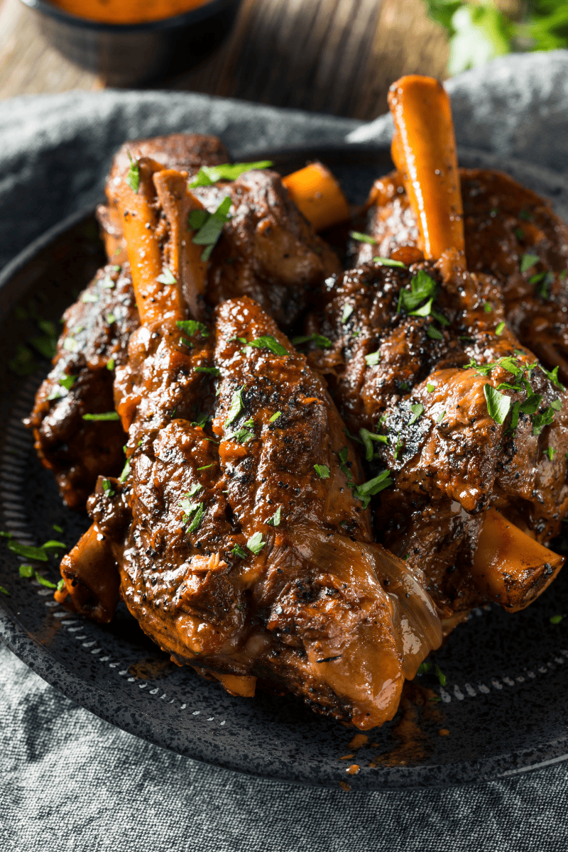 A stock image of braised mutton shanks on a platter.