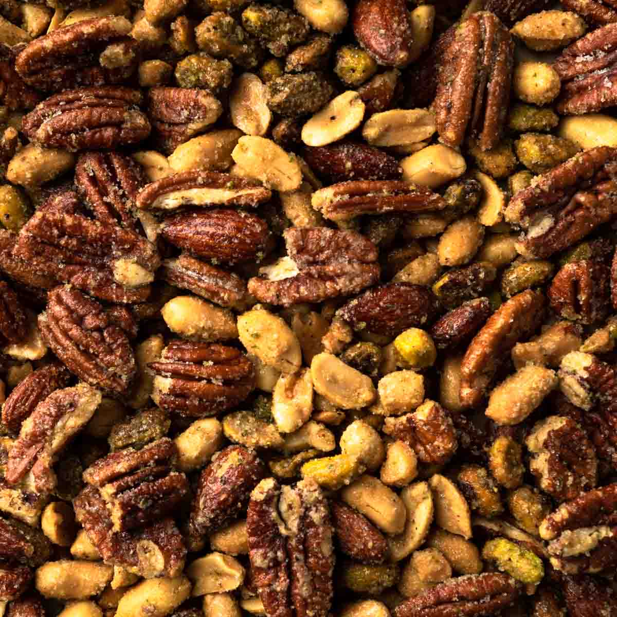 A close up image of oven roasted candied nuts.