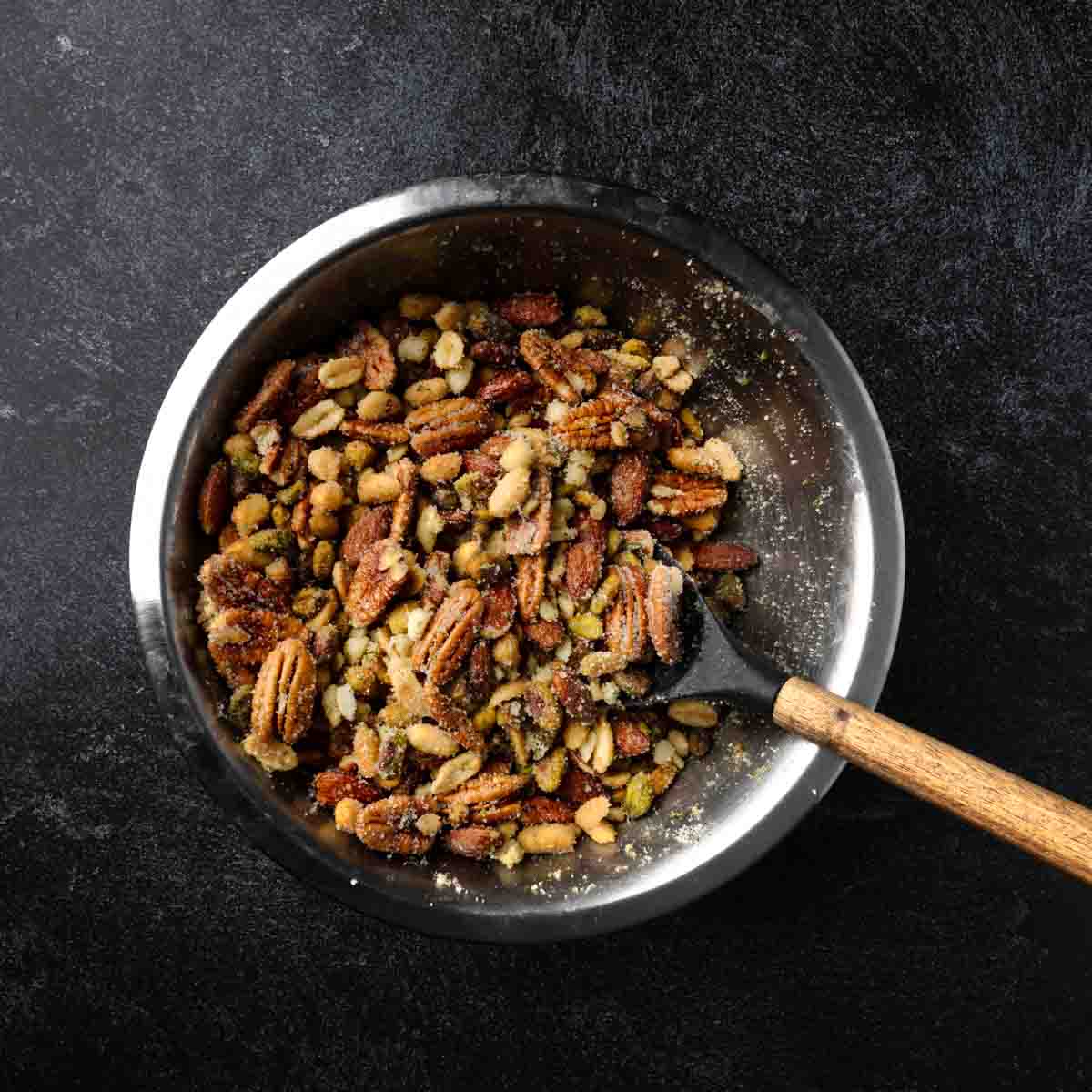 A bowl of nuts tossed in the sugary candy coating.