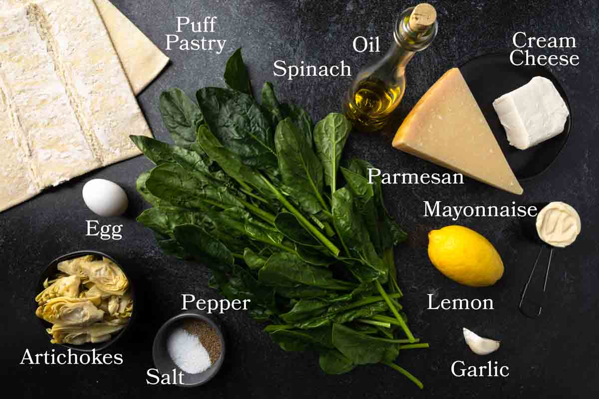 Ingredients needed to make spinach and artichoke puff pastry cups.