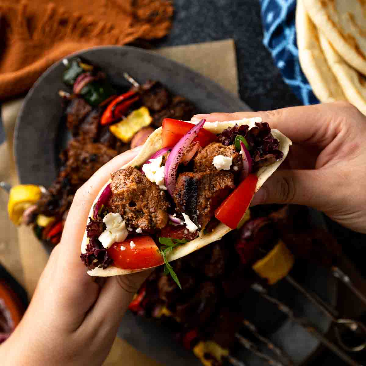 A homemade pita pocket stuffed with grilled lamb shish, feta and sumac onions. 