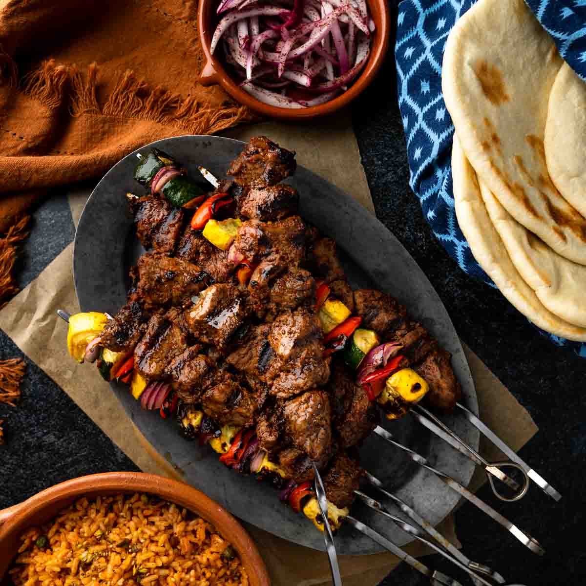 A platter of bahraht spiced lamb shish kebabs.