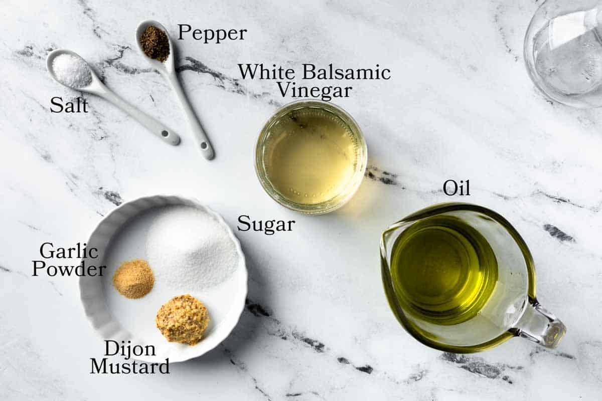 Ingredients needed to make white balsamic vinaigrette.