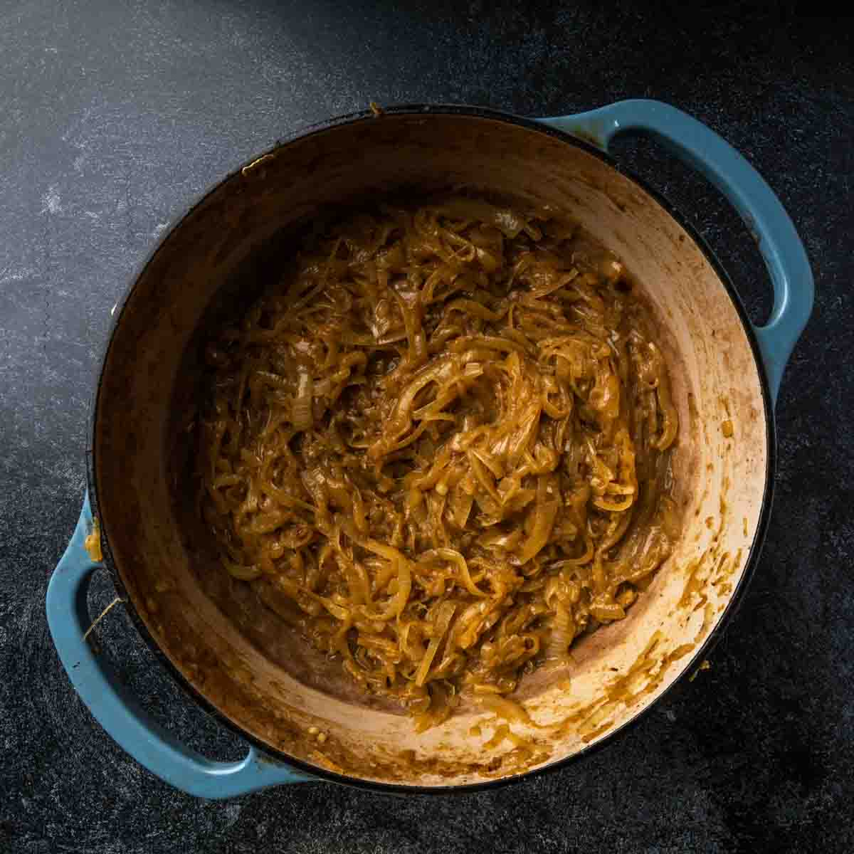 Caramelized onions in a Dutch oven.