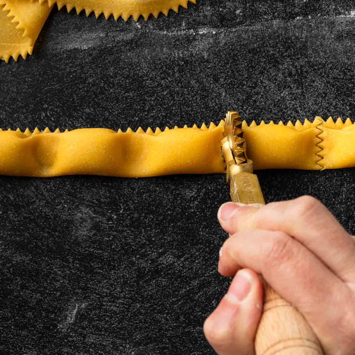 Cutting individual agnolotti.